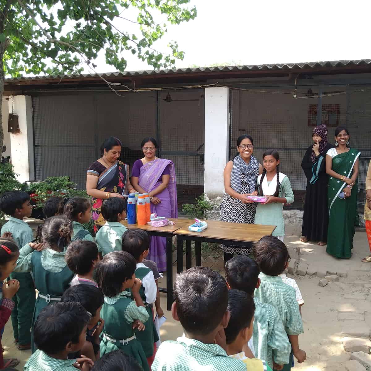 Children receiving supplies provided by Noah's Arks Project Ashakiran